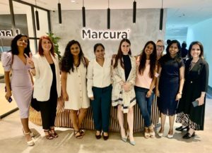 Some of Marcura's Dubai team in front of the new reception